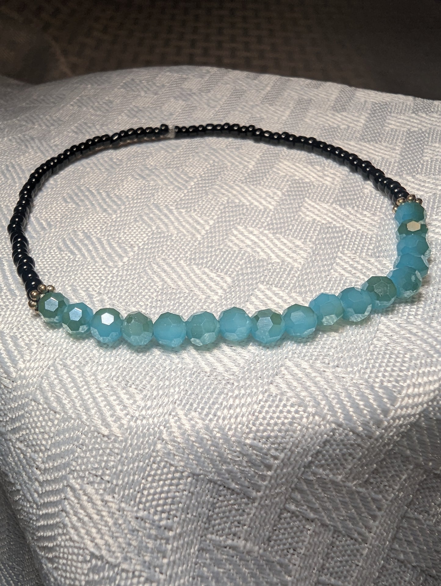 Blue crystal and black beaded bracelet